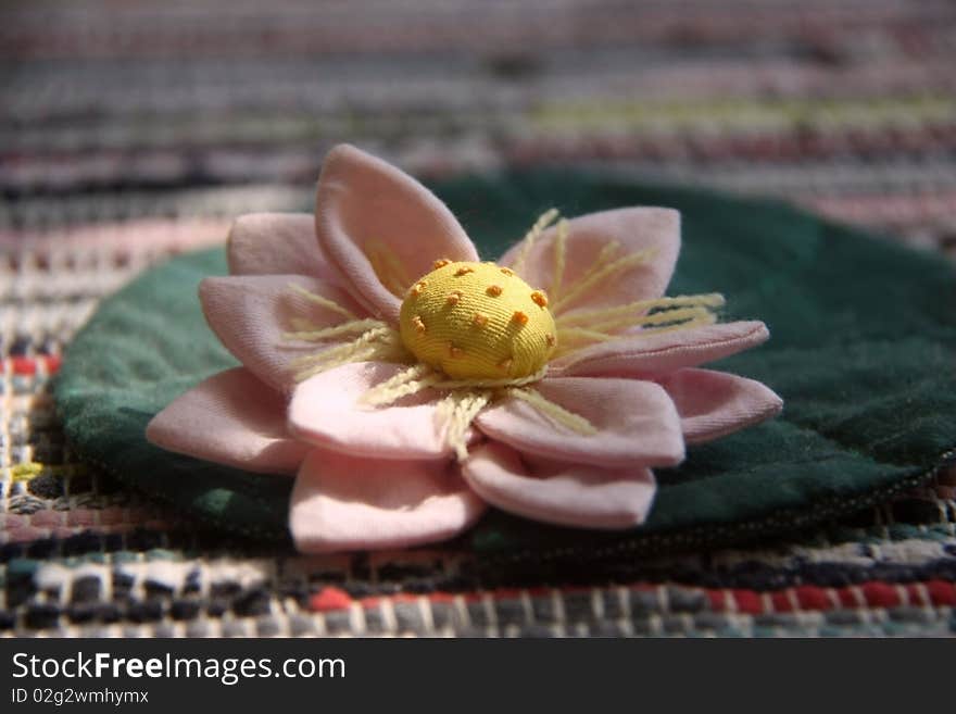 Handsewn lotus flower used as cup coaster. Handsewn lotus flower used as cup coaster