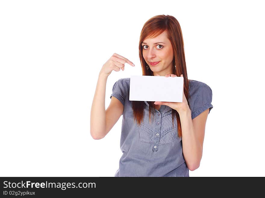 Smiling teenage girl holding an empty card, pointing on it, isolated on white. Smiling teenage girl holding an empty card, pointing on it, isolated on white