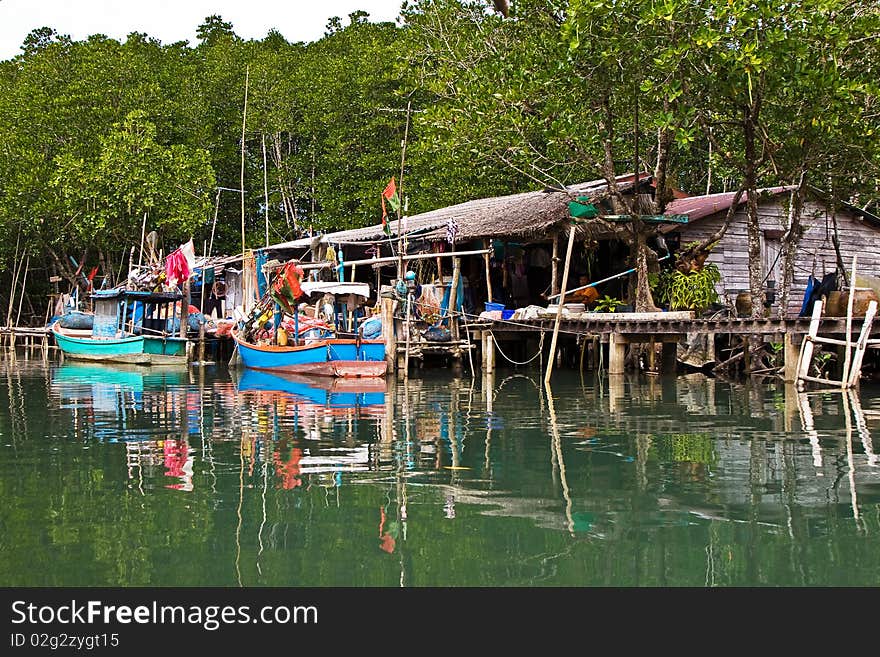 Huts at the mangrove everglades in a small fishermans village in Koh Chang. Huts at the mangrove everglades in a small fishermans village in Koh Chang