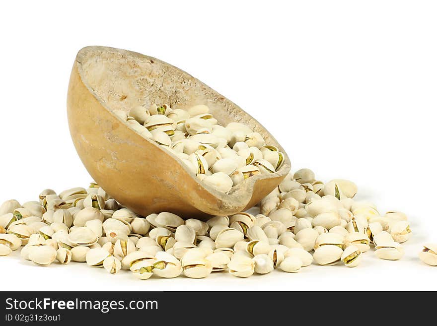 Detail of pistachios on white background