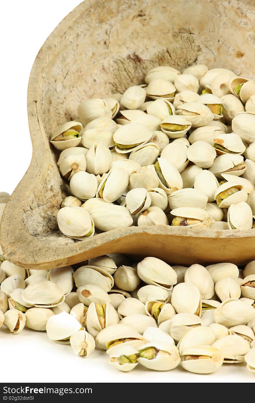 Detail of pistachios on white background