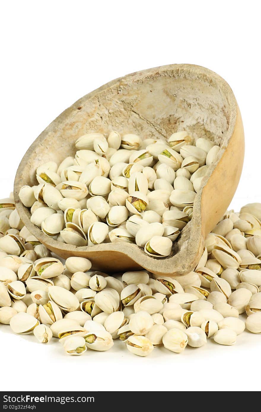 Detail of pistachios on white background