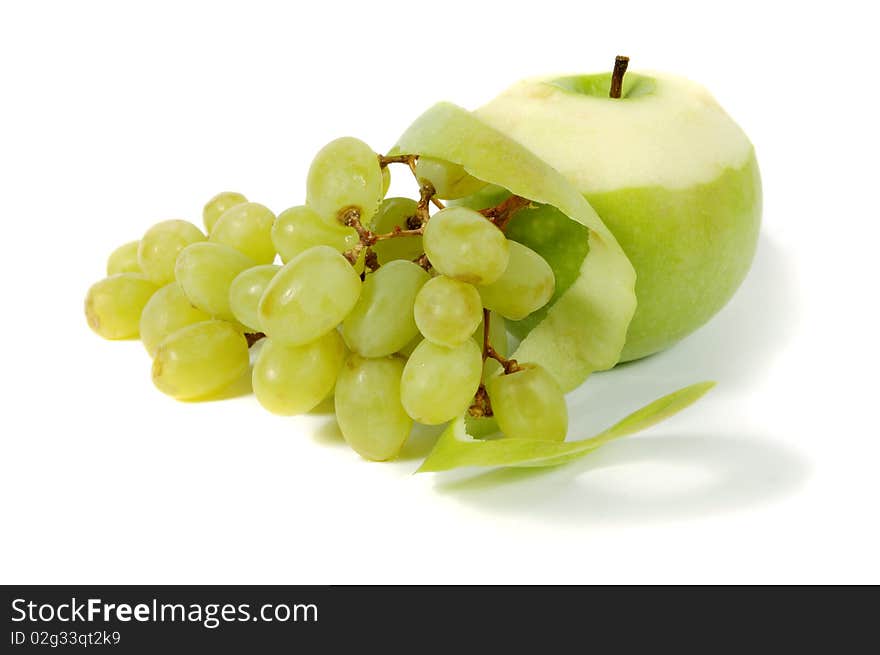 Green Apple and grapes on a white background