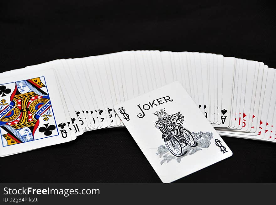 White playing cards and joker