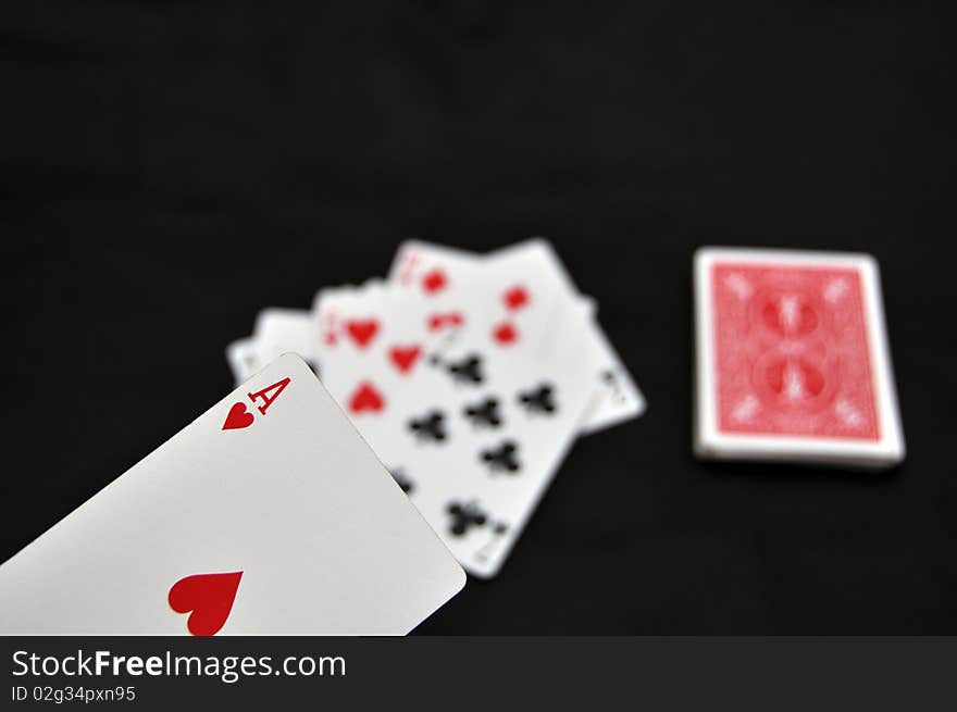 White playing cards and ace of heart