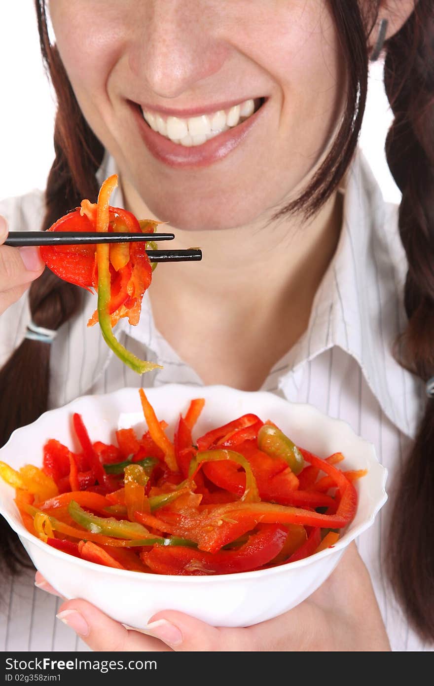 Beautiful woman eating with chopsticks