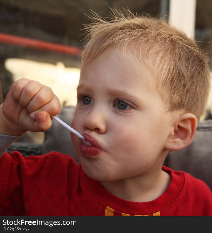 Two years boy eating yogurt. Two years boy eating yogurt