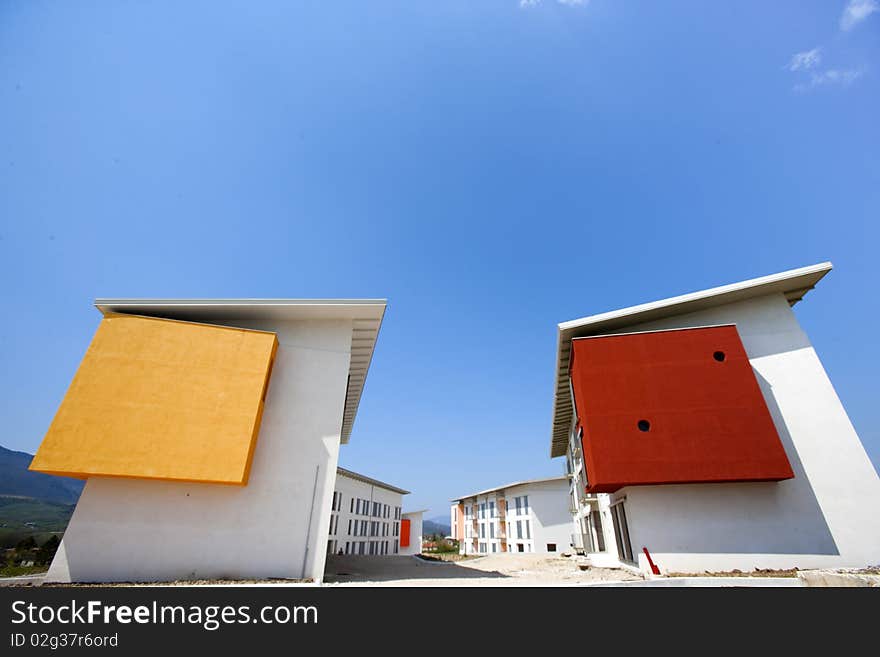 Blu sky, new buildings, with architecture modern and coloured. Blu sky, new buildings, with architecture modern and coloured