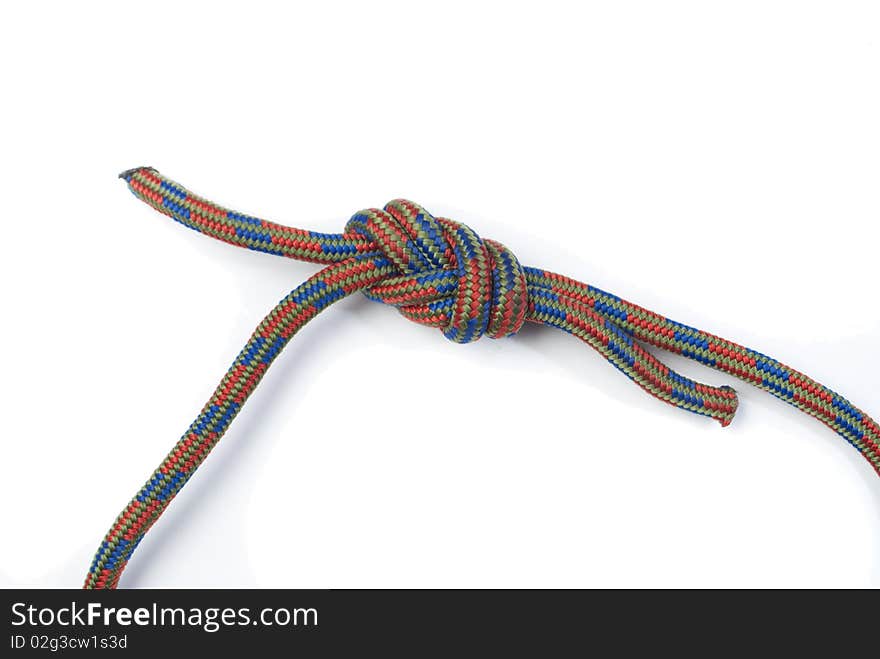 Coloured rope bundled up on white background