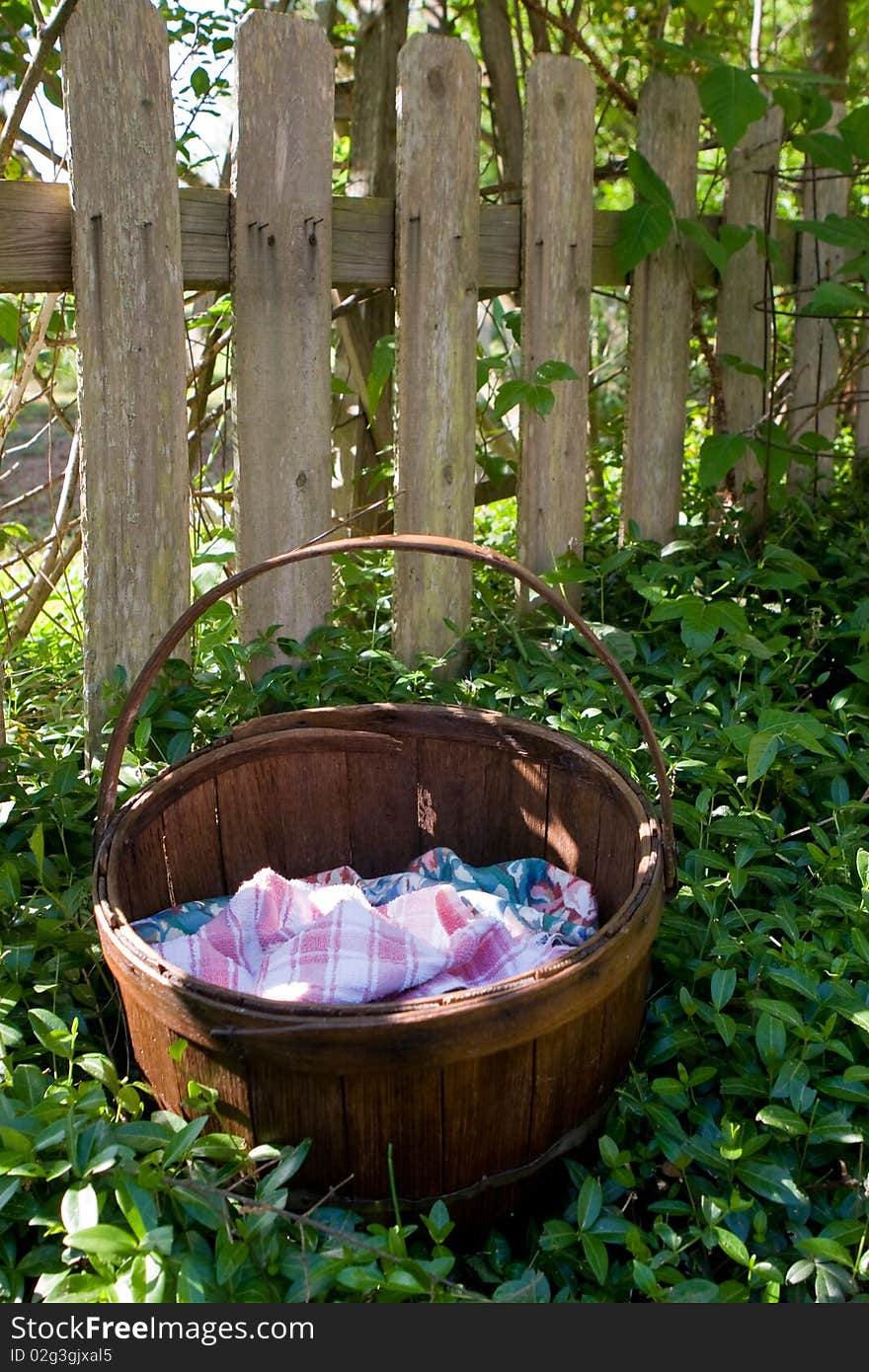 Time for the harvest - an empty basket waits to be filled. Time for the harvest - an empty basket waits to be filled.