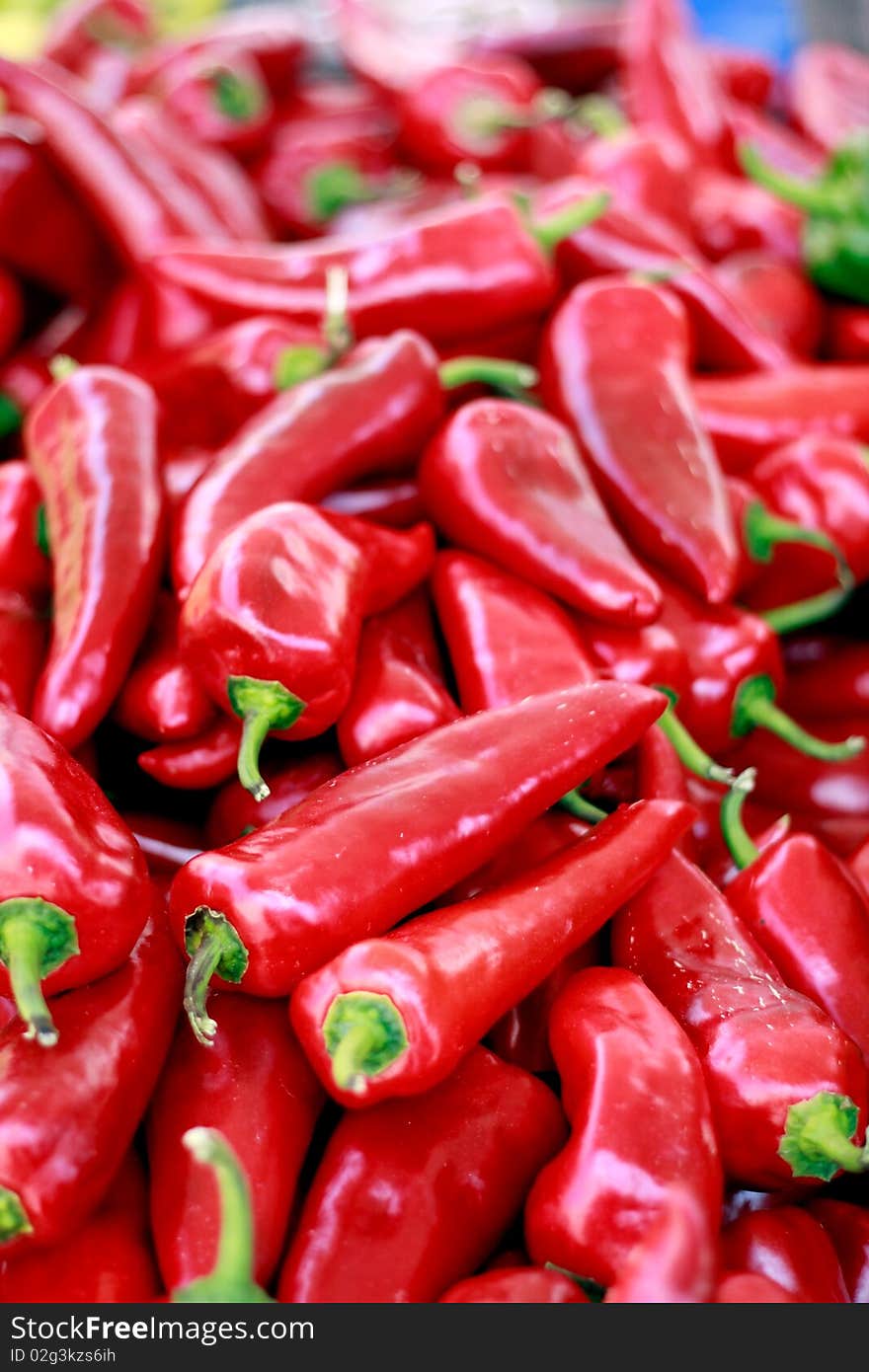 Bunch of organic red peppers on the market