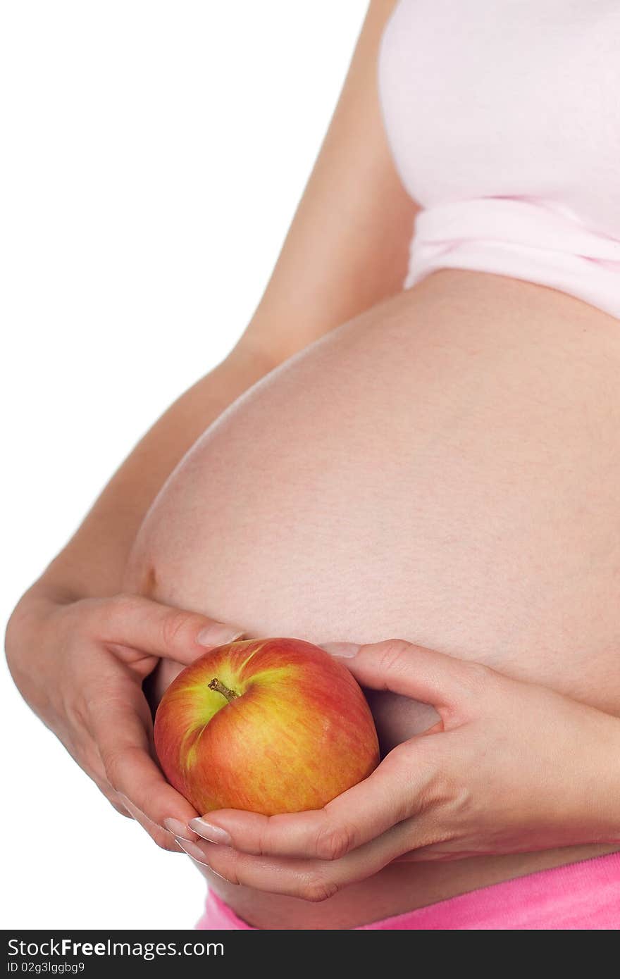 Pregnant girl with an healthy apple in the hand. Pregnant girl with an healthy apple in the hand