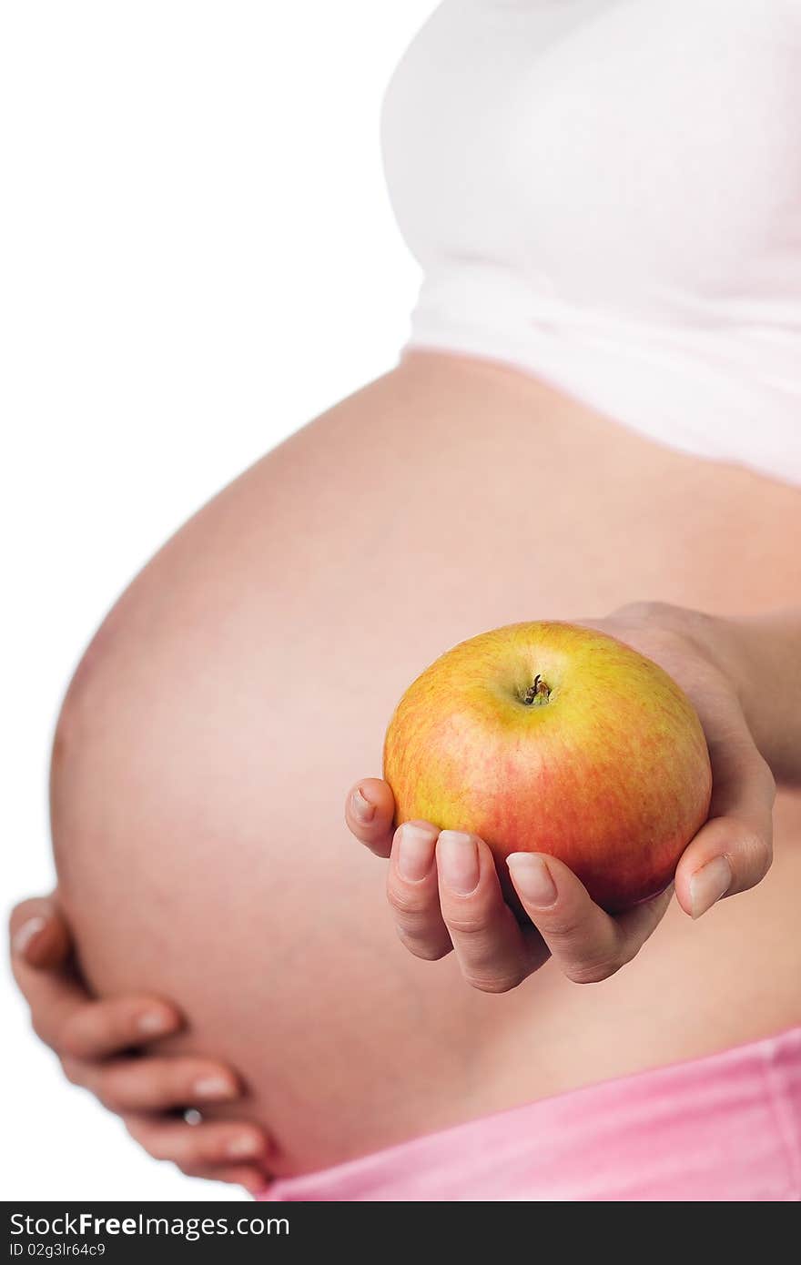 Pregnant girl with an healthy apple in the hand. Pregnant girl with an healthy apple in the hand