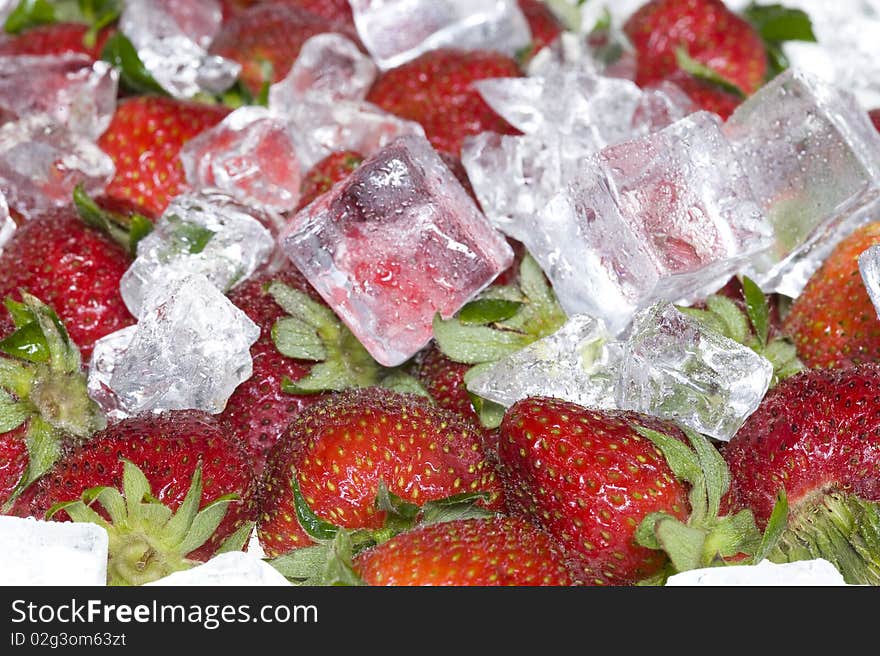 Background with red sweet strawberry and ice. Background with red sweet strawberry and ice