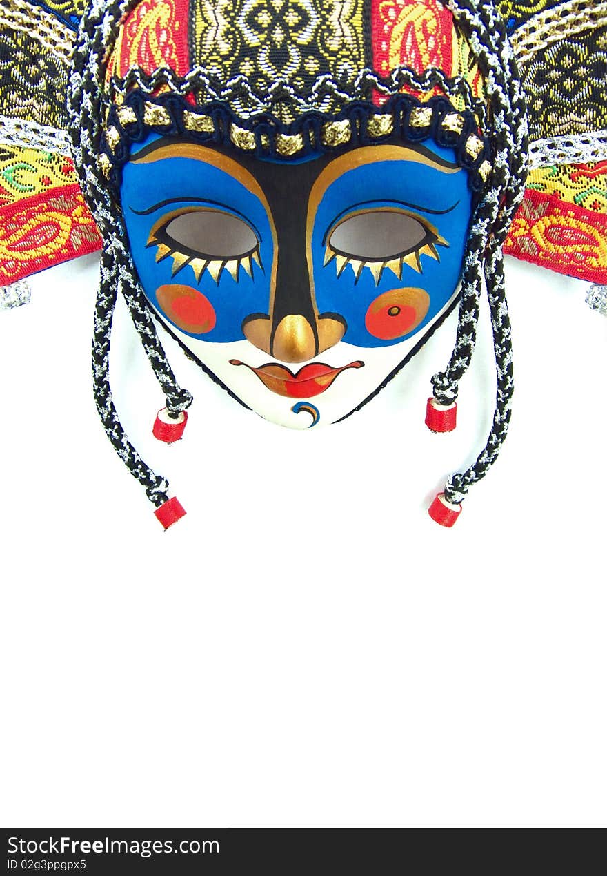 Decorative mask in the Russian style. On a white background. Decorative mask in the Russian style. On a white background