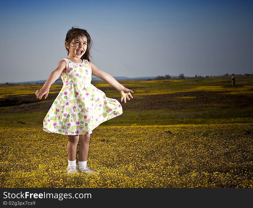 Little Girl In Yellow Field