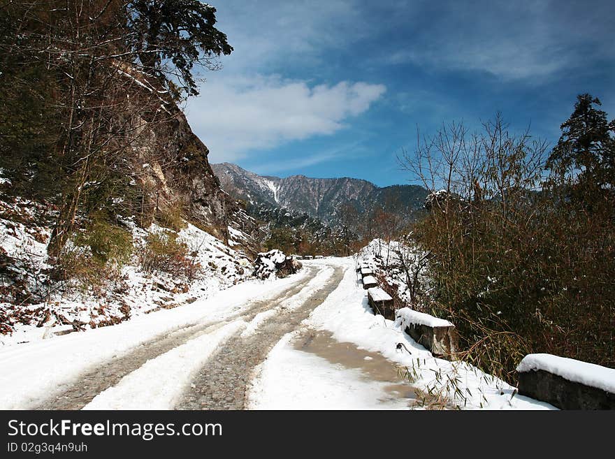 Snow road on mountain in Yunnan, China.