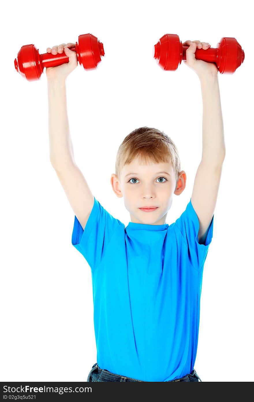 Shot of a boy with dumbbells. Isolated over white background. Shot of a boy with dumbbells. Isolated over white background.