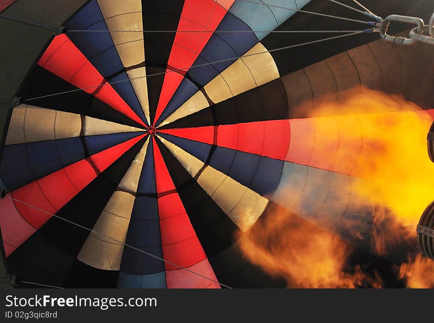 Looking up to see an inside colorful balloon. Looking up to see an inside colorful balloon