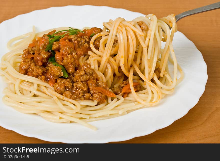 A fork lifting spaghetti