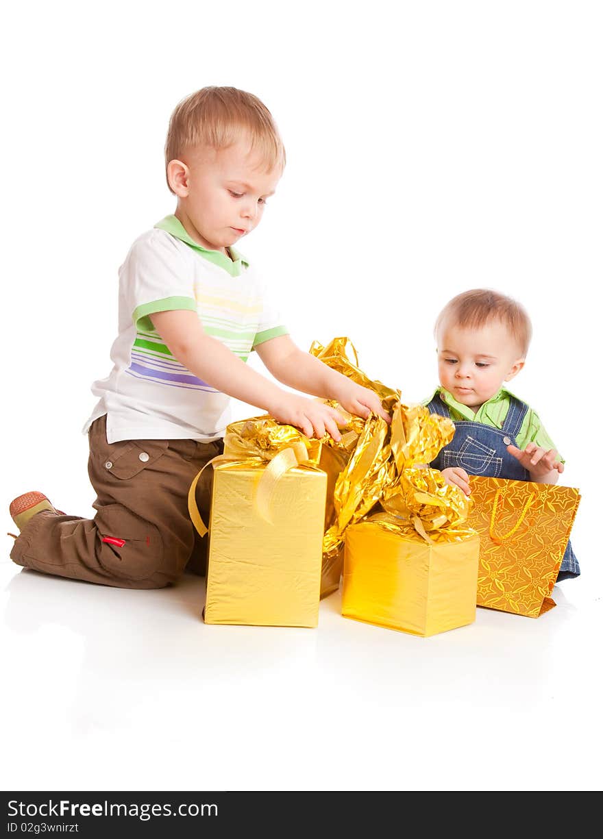 Two boys with gifts. Isolated on white background