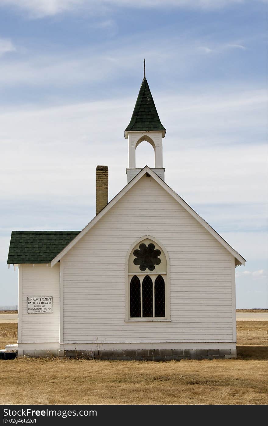 Old United church located in the countyside between two major highways on the Prairies. Old United church located in the countyside between two major highways on the Prairies