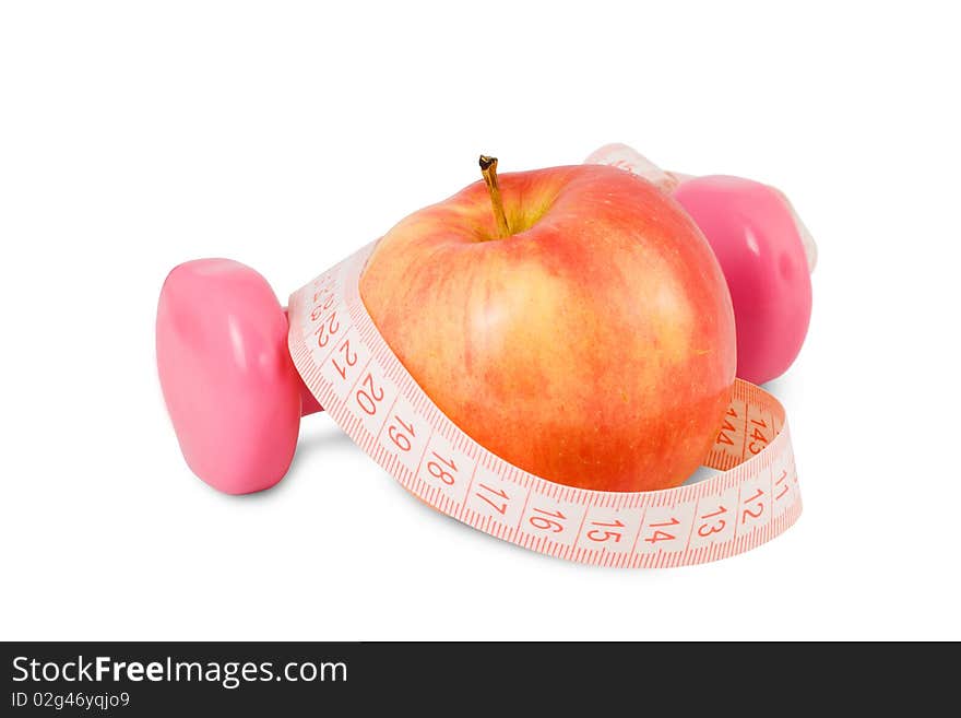 One dumbbell and red apple on a white background. One dumbbell and red apple on a white background