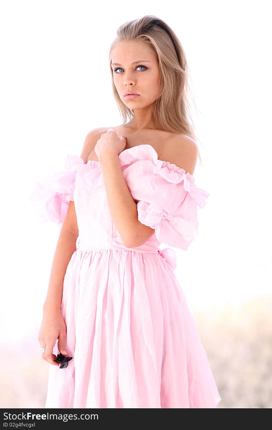 Portrait of young woman in dress. Portrait of young woman in dress