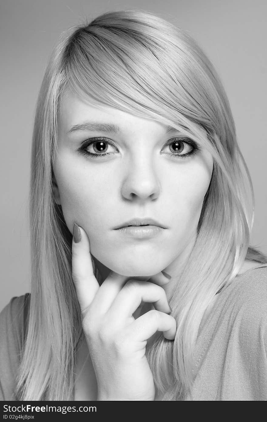 Portrait of beautiful blond woman, studio shot. Portrait of beautiful blond woman, studio shot