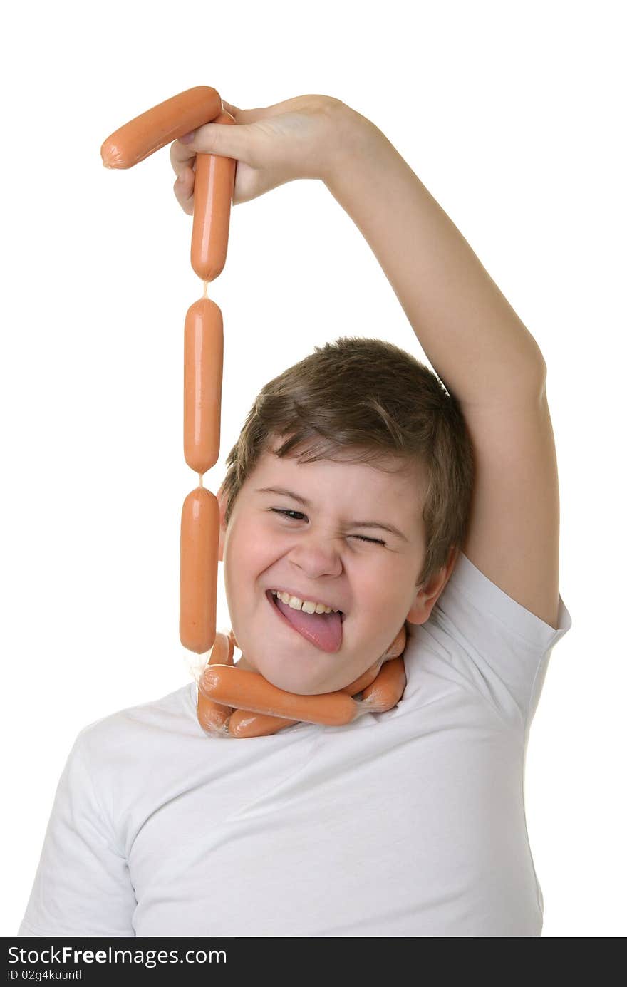 Boy is hung up on sausages isolated in white