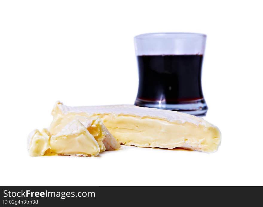 Brie cheese and glass of red wine