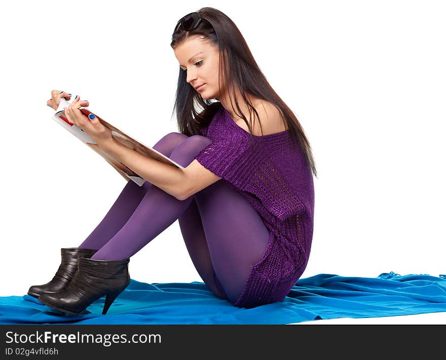 Woman Sitting On The Blue Textile