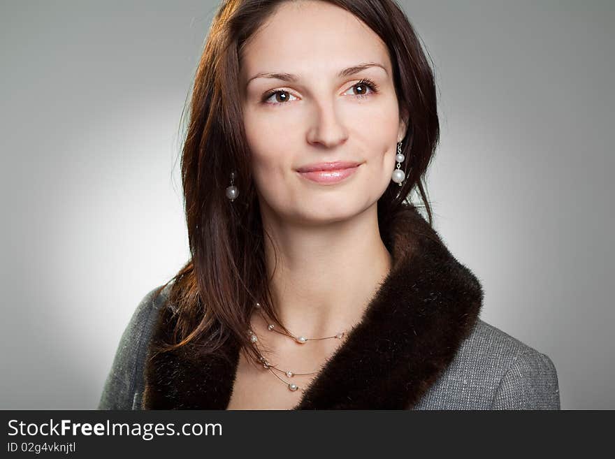 Beautiful young woman posing in studio