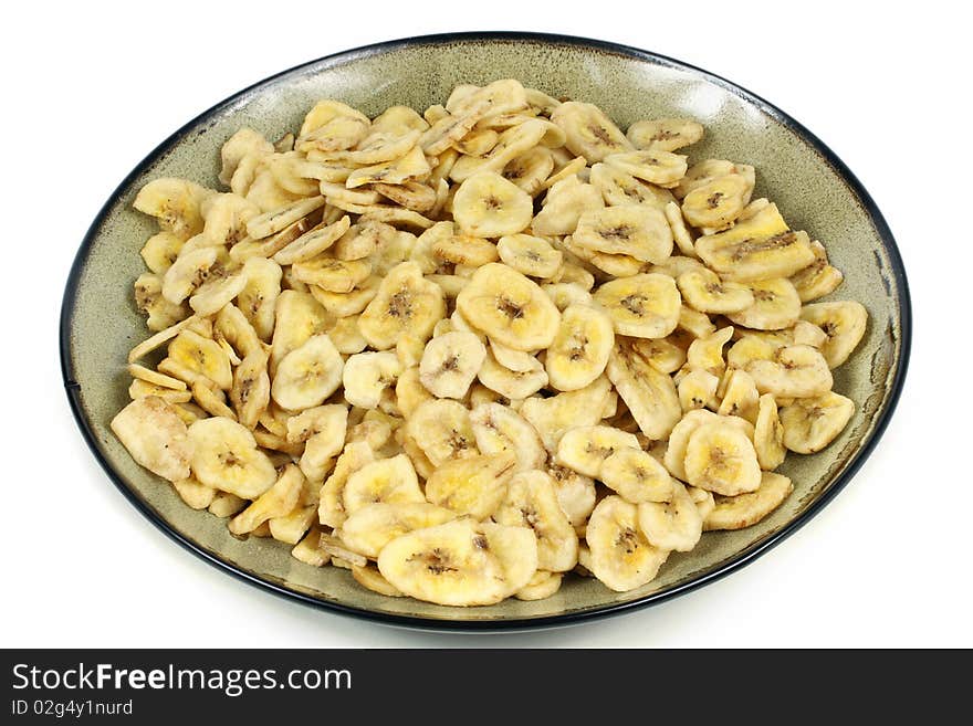 Dried banana slices on white background. Dried banana slices on white background