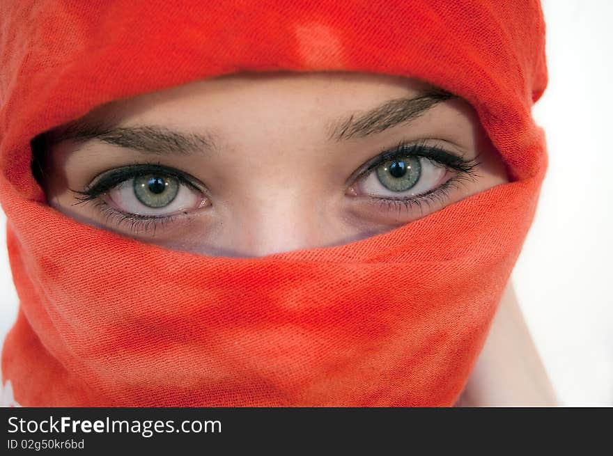 Beautiful Eyes of a Young Woman with red shawl