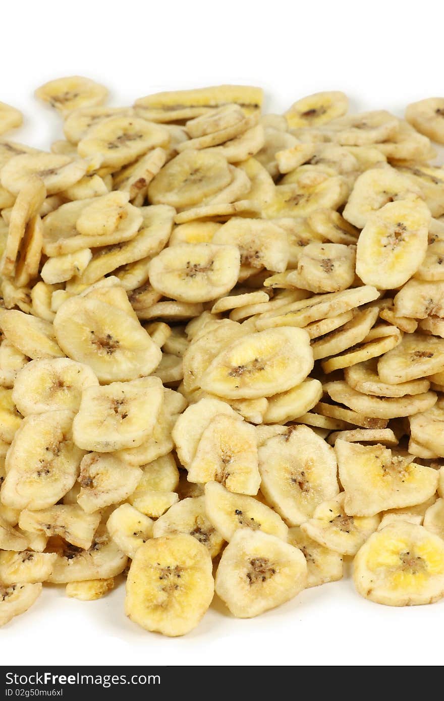 Dried banana slices on white background. Dried banana slices on white background