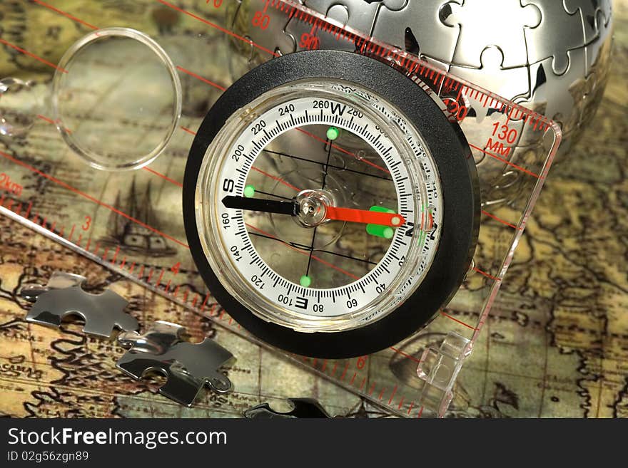 Compass on the old map