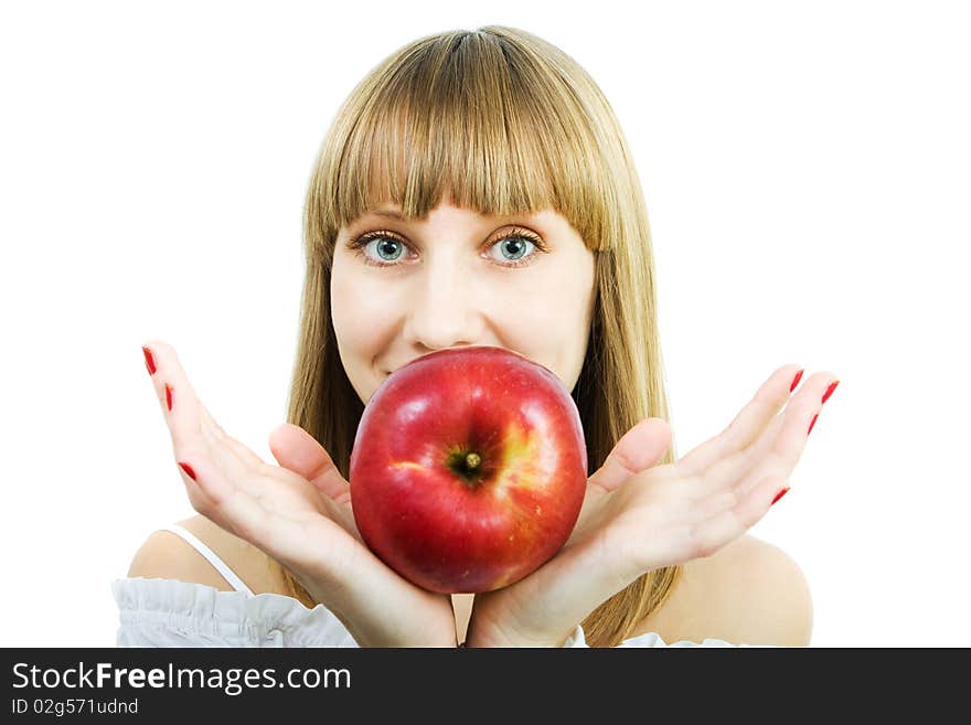 Young beautiful woman with a red apple on a white background