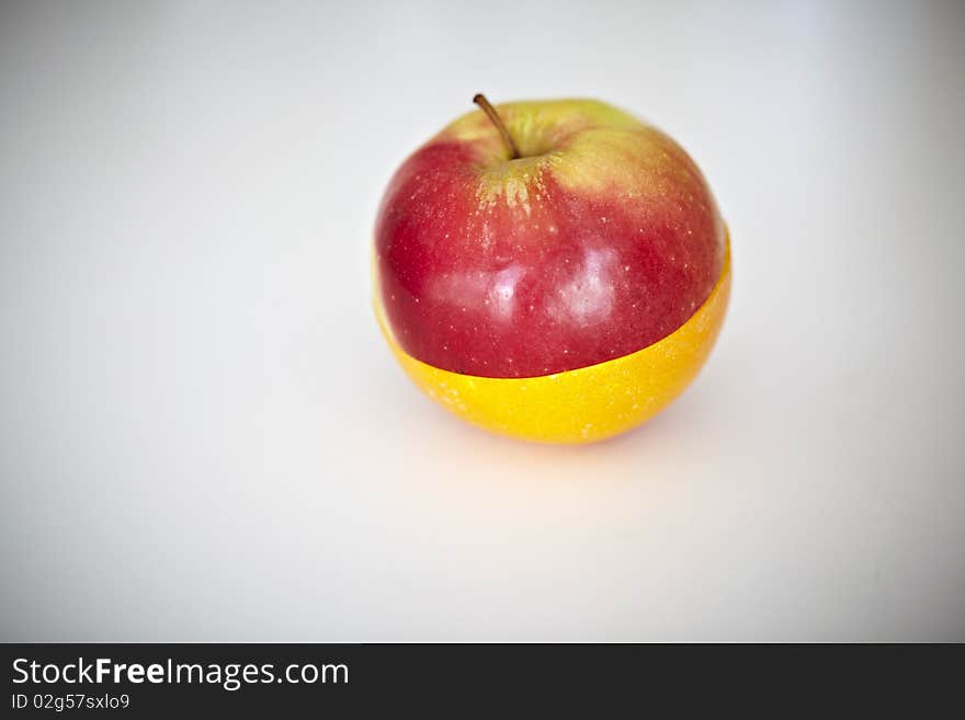 Orange and apple fruit halves