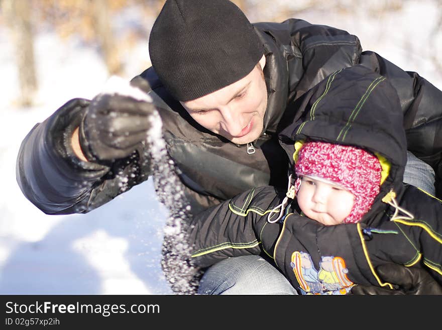 Father strew snow before son. Father strew snow before son