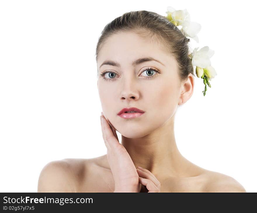 Portrait of beautiful girl with white freesia on grey background. Portrait of beautiful girl with white freesia on grey background