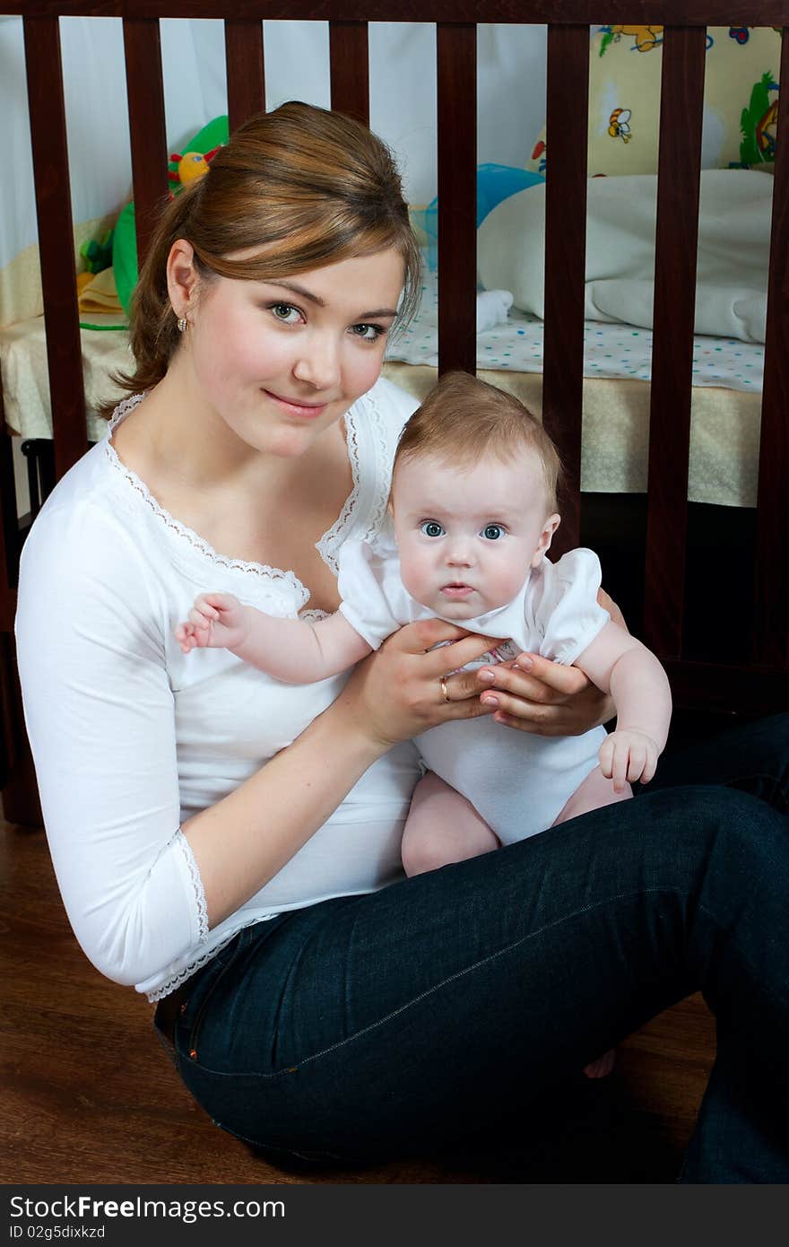 Young beautiful mother with litlle cute baby daughter. Young beautiful mother with litlle cute baby daughter