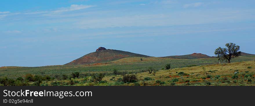 A peak from an old mountain range near the Barrier Highway, Outback South Australia. A peak from an old mountain range near the Barrier Highway, Outback South Australia.