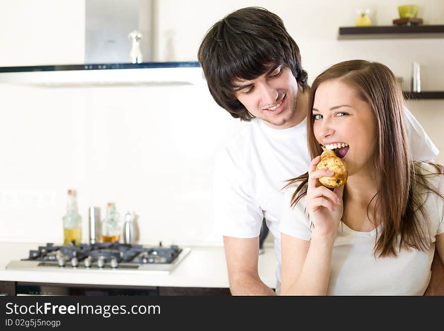 Beautiful girl with pear and boy