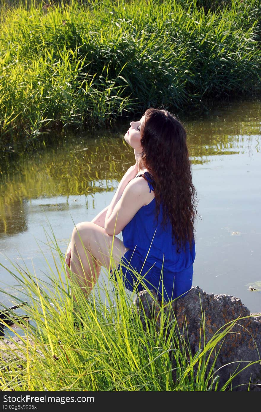 Pretty young girl near the river. Pretty young girl near the river