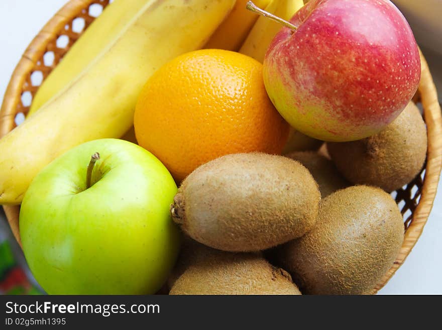 Fruit are in a small basket (background from fruit)