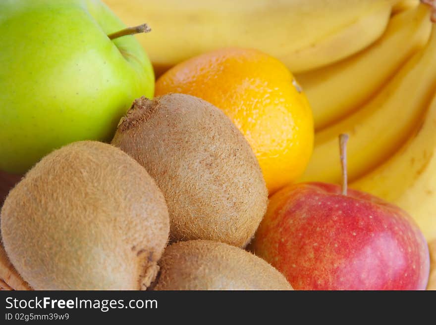 Fruit are in a small basket (background from fruit)