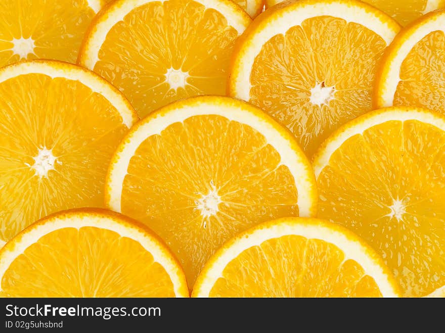 Slices of orange close up. Can use as background. Slices of orange close up. Can use as background