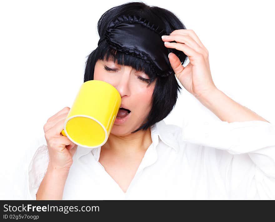 Portrait of female yawning girl wearing sleeping eye beauty mask. Portrait of female yawning girl wearing sleeping eye beauty mask