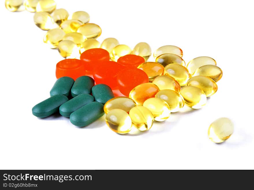 Colourful pills and capsules (red, yellow, green). Colourful pills and capsules (red, yellow, green)